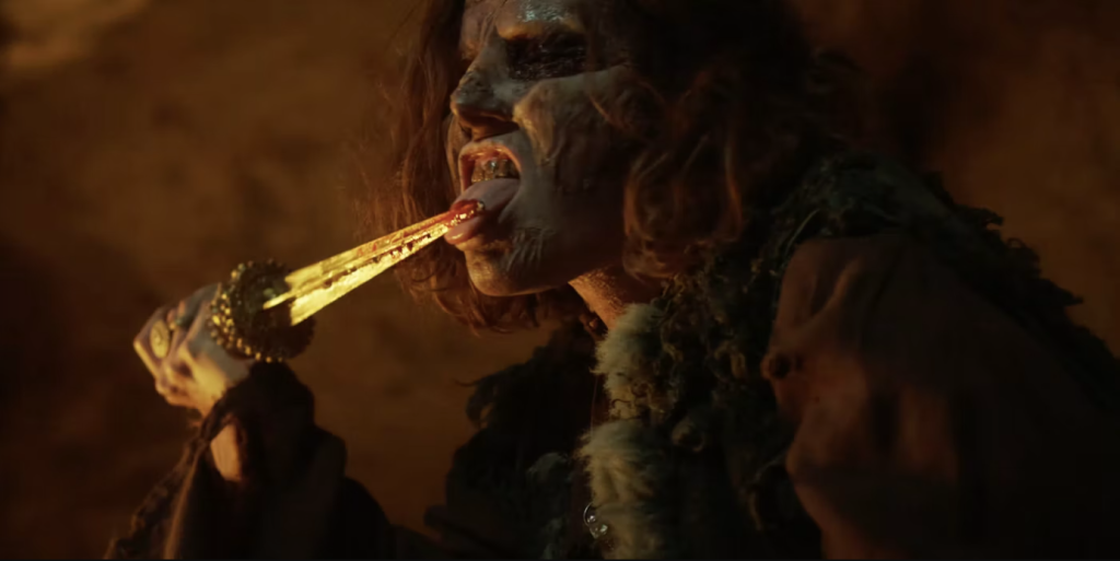 Circe licks the blood of her newborn from her relic, the Demon Slayer. This is perhaps one of the more disturbing scenes, which is a bit of a wild departure for the Subspecies franchise.